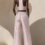 Lilas Perlé Open-Back Satin Set in pearly pink satin. PHAGE Paris