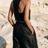 Elasticated waistband and side pockets on black satin trousers – PHAGE Paris