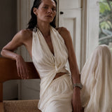 Aquamarine chiffon blouse, halter neckline, waist cut-out, open back PHAGE Paris