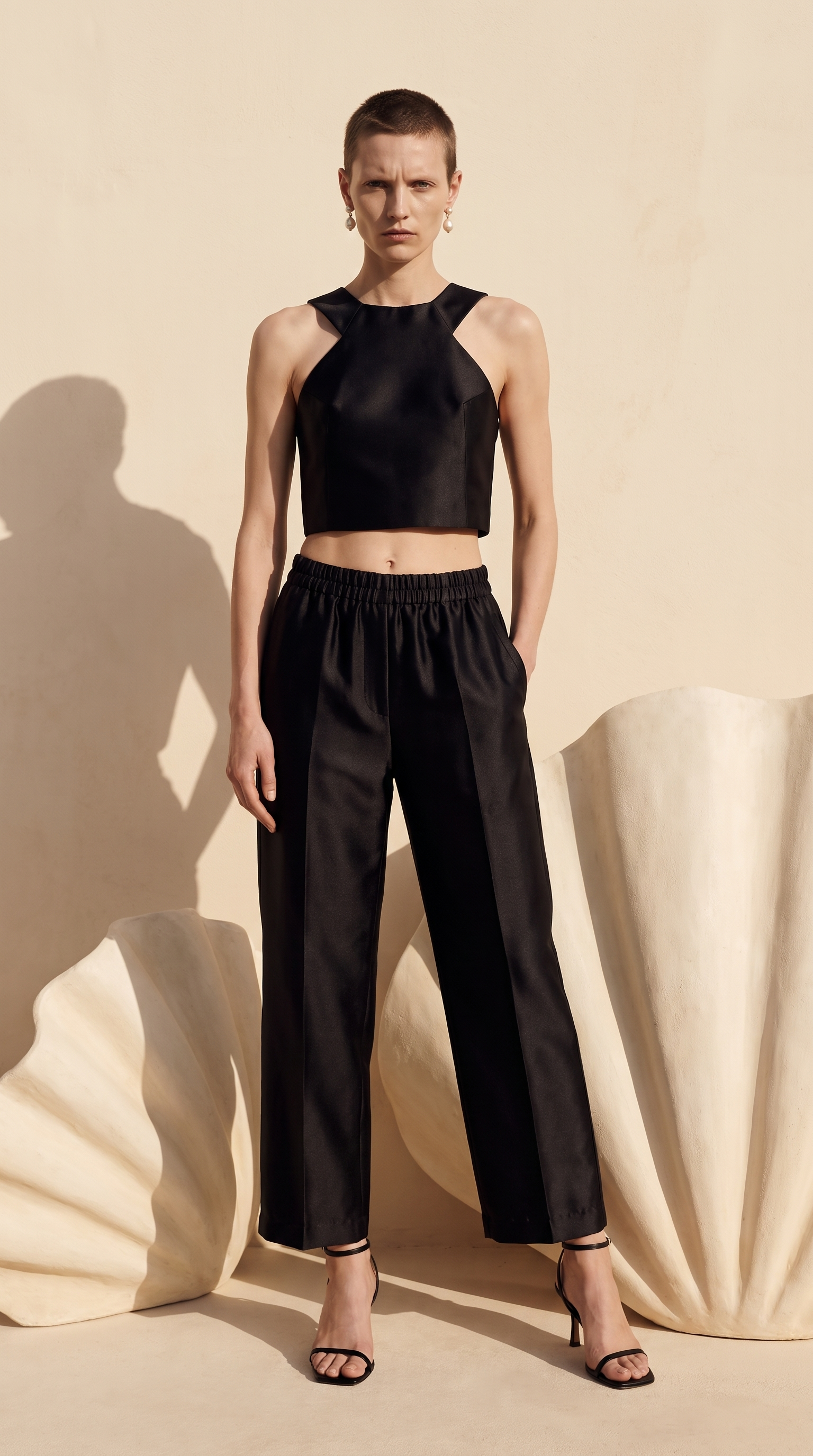Deep geometric open back with minimal fastening at the nape – PHAGE Paris