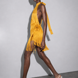 Cross-draped front with triangular fringe placement in saffron yellow. PHAGE Paris